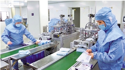 德清企業(yè) 趕制口罩